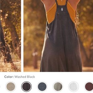 Free people hot shot onesie in washed black. Never worn still with tags.